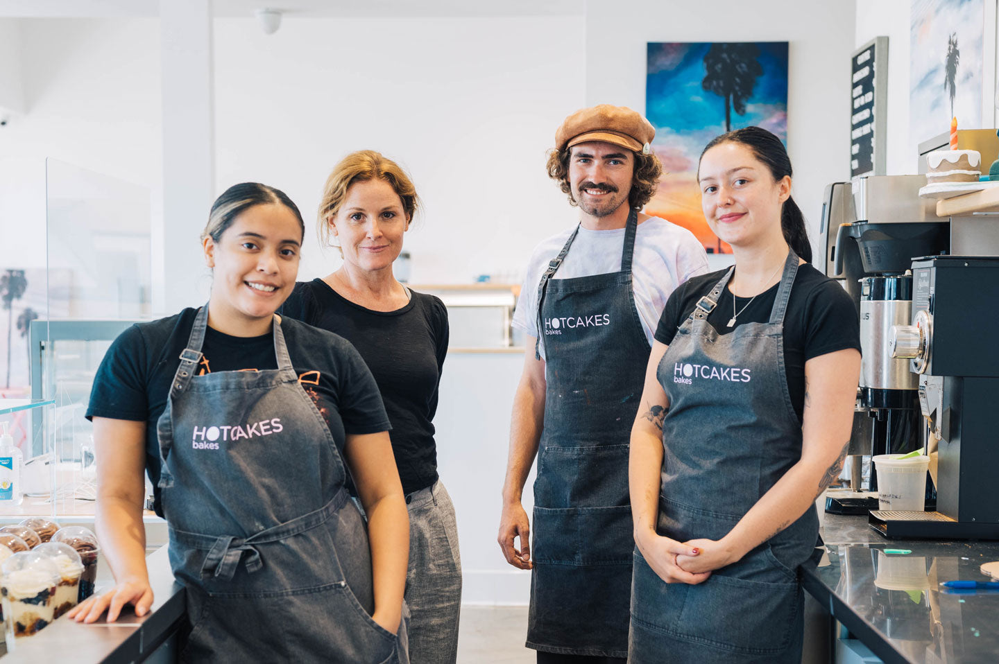 Hotcakes Bakes staff posing and smiling